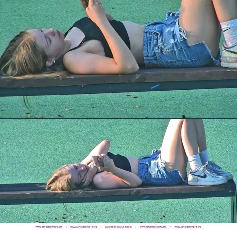 Sexy Teen In Shorts Laying In The Park